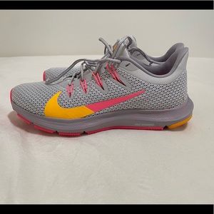 Nike Gray Athletic Shoes with Pink and Yellow Accents